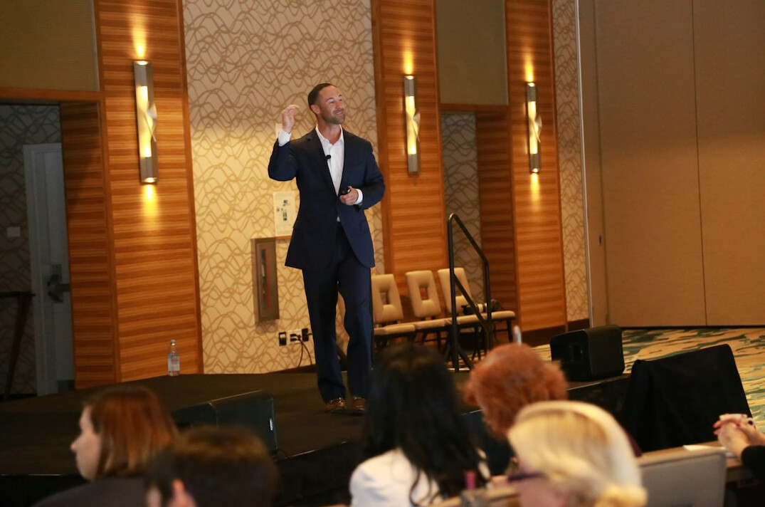 business leader on stage