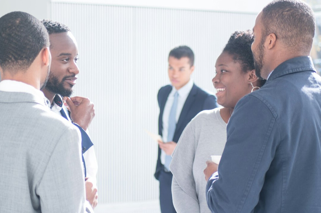 executives networking after training