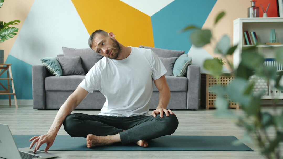 man doing breathing exercises