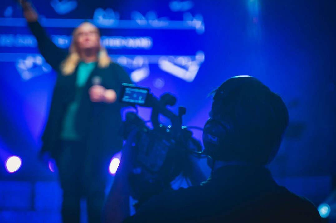 business leader on stage