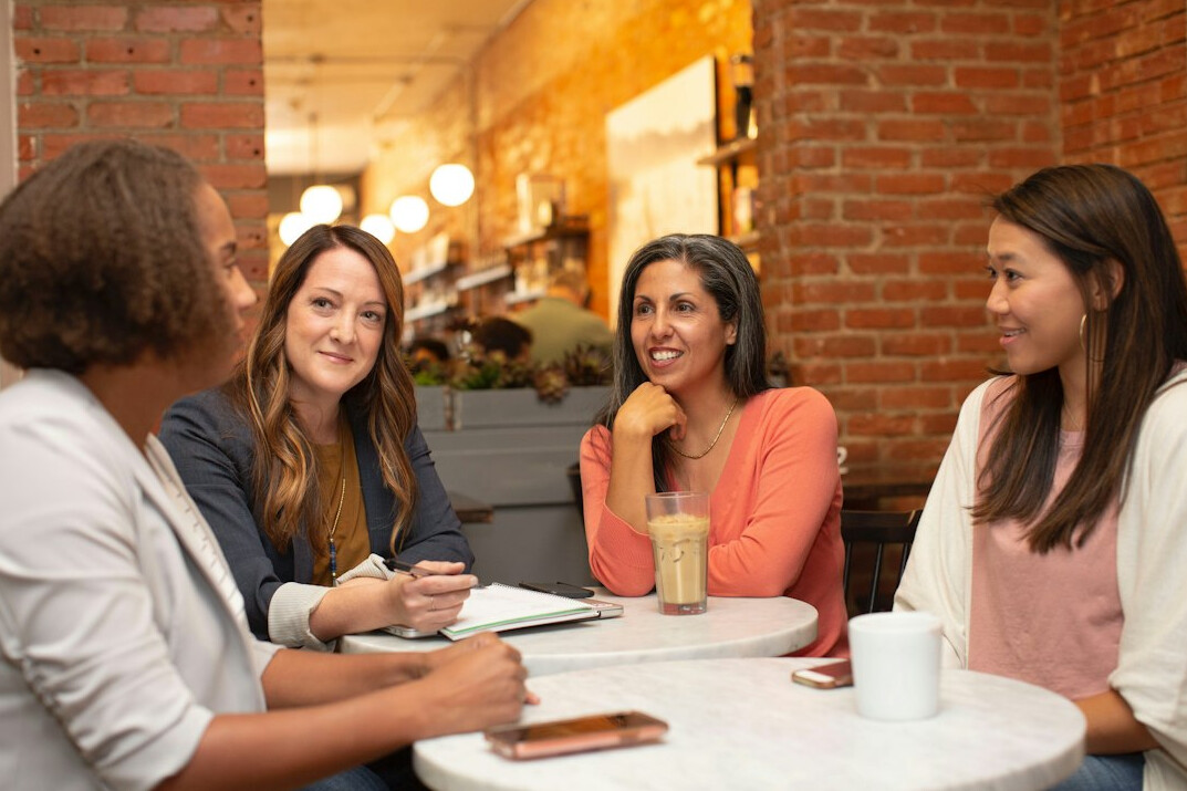 woman leading team meeting
