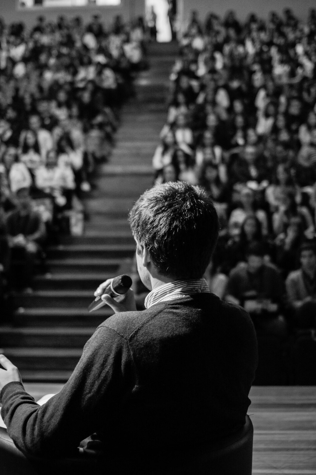 man giving keynote speech