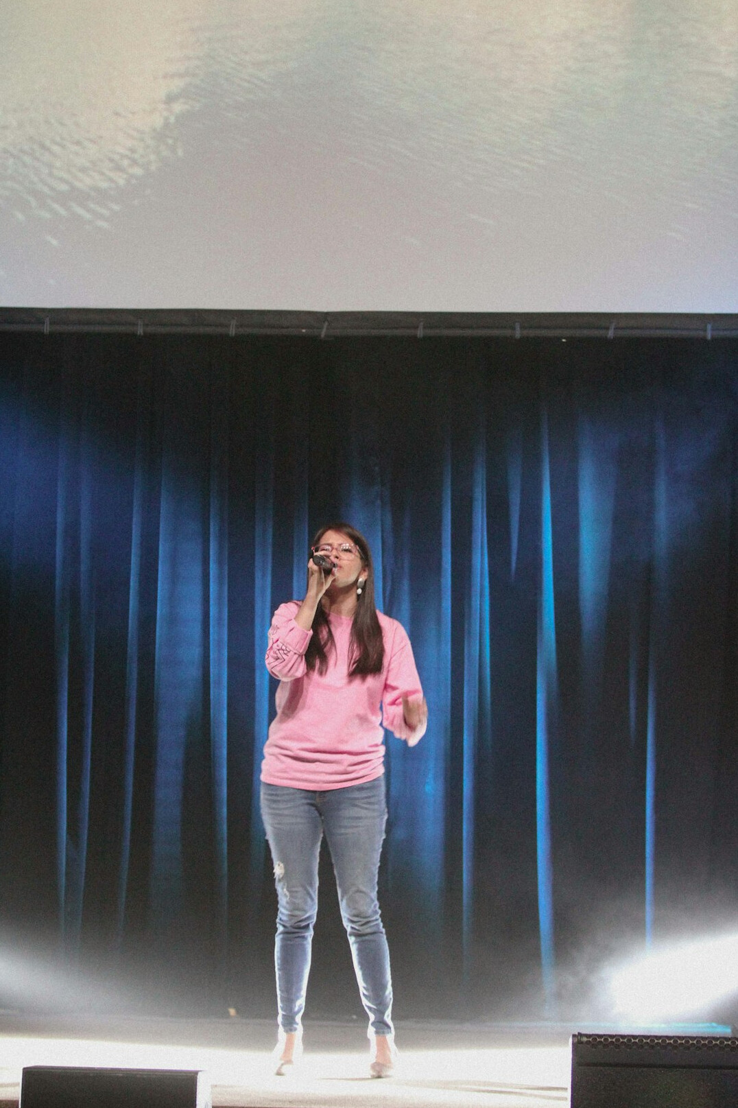 leader performing on stage