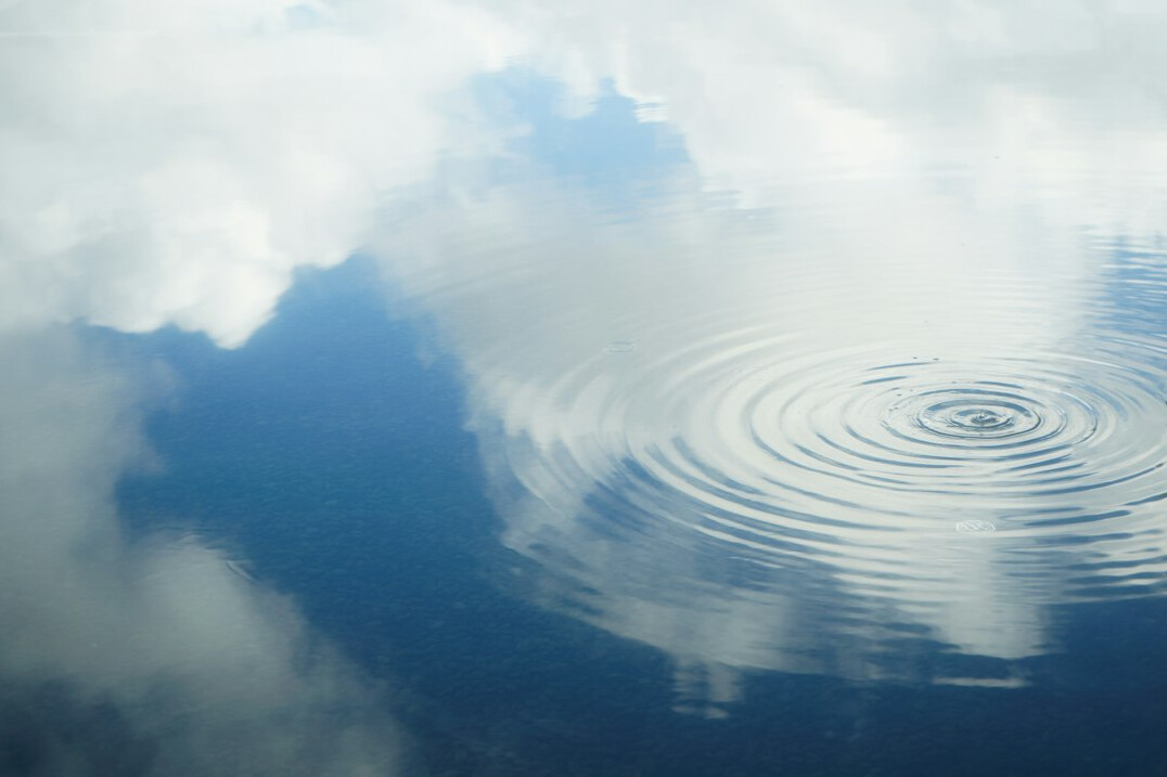 Soft ripples on a calm water surface